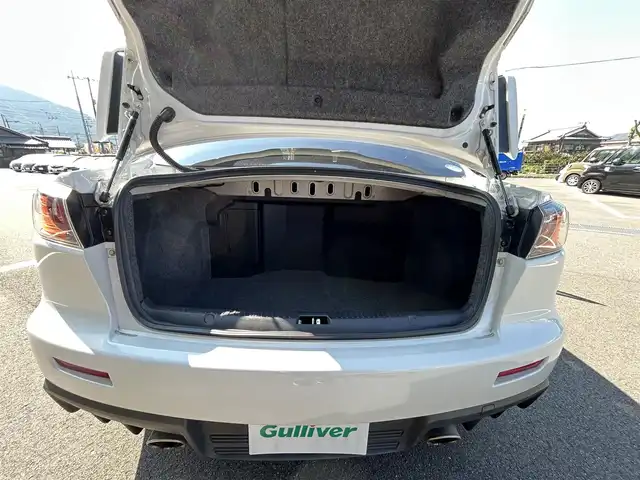 三菱 ランサー GSR エボリューションⅩ 愛媛県 2015(平27)年 14.2万km シルキーホワイト KENWOOD7型ナビ(AM/FM/フルセグTV)/RECARO製フルバケットシート/ENKEI製18インチ鋳造アルミホイール/ツインクラッチSST/パドルシフト/TEIN車高調/brembo製ブレーキキャリパー/ツイステッドウイングタイプ大型リヤスポイラー/本革巻3本スポークステアリングホイール/S-AWC/ドライブレコーダー/ASSURAレーダー探知機(AR-252GA) /BRIDGESTONEタイヤ空気圧モニタリングシステム/電格ミラー/ISOFIX/オートライト/現状サマー(純正AW)(245/40/R18)/YOKOHAMA ADVAN NEOVA AD09