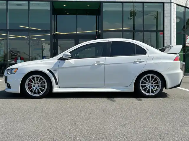 三菱 ランサー GSR エボリューションⅩ 愛媛県 2015(平27)年 14.2万km シルキーホワイト KENWOOD7型ナビ(AM/FM/フルセグTV)/RECARO製フルバケットシート/ENKEI製18インチ鋳造アルミホイール/ツインクラッチSST/パドルシフト/TEIN車高調/brembo製ブレーキキャリパー/ツイステッドウイングタイプ大型リヤスポイラー/本革巻3本スポークステアリングホイール/S-AWC/ドライブレコーダー/ASSURAレーダー探知機(AR-252GA) /BRIDGESTONEタイヤ空気圧モニタリングシステム/電格ミラー/ISOFIX/オートライト/現状サマー(純正AW)(245/40/R18)/YOKOHAMA ADVAN NEOVA AD09