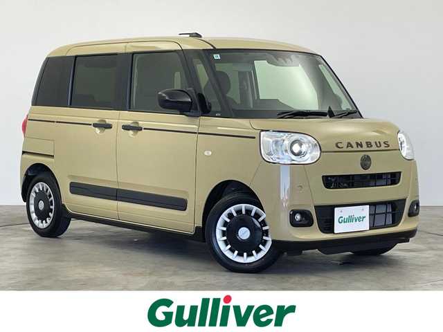 ダイハツ ムーヴ キャンバス セオリー G ターボ 群馬県 2024(令6)年 1万km サンドベージュメタリック 社外７インチナビ　バックカメラ　両側パワースライドドア　ＬＥＤライト　オートハイビーム　シートヒーター　ステアリングリモコン　電子パーキング　オートブレーキホールド　スマートキー　ＥＴＣ　禁煙車