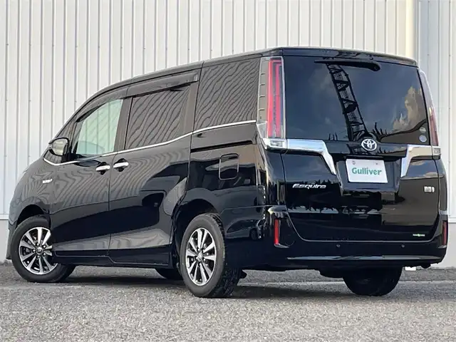 トヨタ エスクァイア ハイブリッド Gi プレミアムパッケージ 熊本県 2020(令2)年 6.6万km ブラック 社外９型ナビ/・AM/FM/CD/DVD/TV/BT/・フルセグTV/トヨタセーフティーセンス/・プリクラッシュセーフティー/・レーンディパーチャーアラート/・オートマチックハイビーム/バックカメラ/両側パワースライドドア/LEDヘッドライト/アイドリングストップ/純正フロアマット/ドライブレコーダー/社外フリップダウンモニター/純正エンジンスターター/ハーフレザーシート/・前席シートヒーター/ステアリングヒーター/コンビステアリング/電動格納ミラー/・ウィンカーミラー