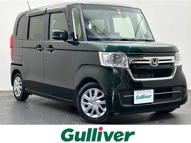 ホンダ Ｎ ＢＯＸ L 愛媛県 2023(令5)年 2.9万km ブリティッシュグリーンP ・９型ナビ/（フルセグＴＶ・ＢＴ・ＣＤ・ＤＶＤ・ＦＭ・ＡＭ・ＳＤ・ａｐｐｌｅ　ｃａｒｐｌａｙ・ａｎｄｒｏｉｄ　ａｕｔｏ・ＵＳＢ）/・バックカメラ　/・１１．６型後席モニター　/・ＥＴＣ　/・前後ドラレコ　/・レーダークルーズコントロール/・片側パワースライドドア/・衝突軽減ブレーキ/・レーンキープアシスト/・DN席シートヒーター/・スペアキー