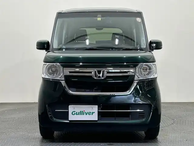 ホンダ Ｎ ＢＯＸ L 愛媛県 2023(令5)年 2.9万km ブリティッシュグリーンP ・９型ナビ/（フルセグＴＶ・ＢＴ・ＣＤ・ＤＶＤ・ＦＭ・ＡＭ・ＳＤ・ａｐｐｌｅ　ｃａｒｐｌａｙ・ａｎｄｒｏｉｄ　ａｕｔｏ・ＵＳＢ）/・バックカメラ　/・１１．６型後席モニター　/・ＥＴＣ　/・前後ドラレコ　/・レーダークルーズコントロール/・片側パワースライドドア/・衝突軽減ブレーキ/・レーンキープアシスト/・DN席シートヒーター/・スペアキー