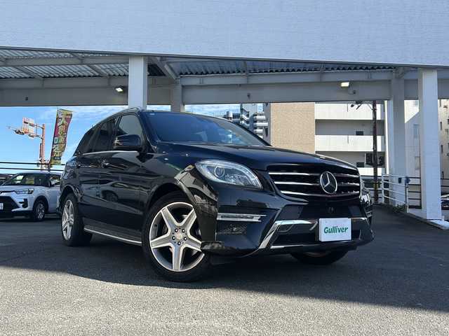 メルセデス・ベンツ ＭＬ３５０ ブルーテック 4マチック 宮崎県 2014(平26)年 12.9万km オブシディアンブラック メモリナビ（フルセグ/BT）/全方位カメラ/レーダークルーズコントロール/BSM/サンルーフ/プッシュスタート/電動リアゲート/パワーシート（D/N席）/シートヒーター全席/ダウンヒルアシストコントロール/車高調整オフロードモード/純正アルミホイール/純正ETC/オートライト