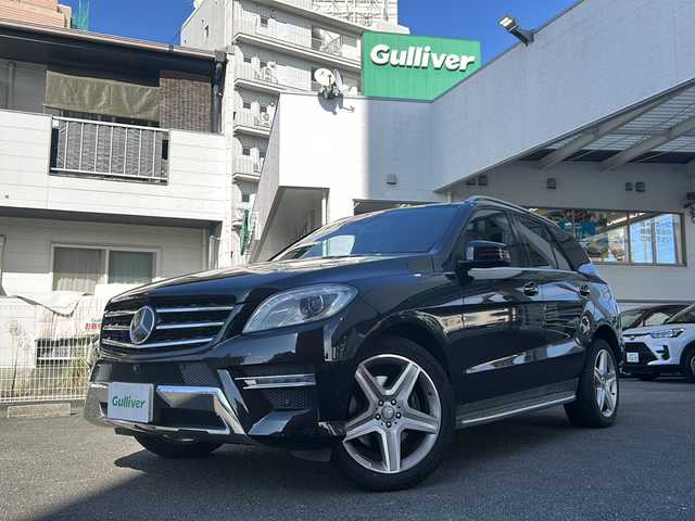 メルセデス・ベンツ ＭＬ３５０ ブルーテック 4マチック 宮崎県 2014(平26)年 12.9万km オブシディアンブラック メモリナビ（フルセグ/BT）/全方位カメラ/レーダークルーズコントロール/BSM/サンルーフ/プッシュスタート/電動リアゲート/パワーシート（D/N席）/シートヒーター全席/ダウンヒルアシストコントロール/車高調整オフロードモード/純正アルミホイール/純正ETC/オートライト
