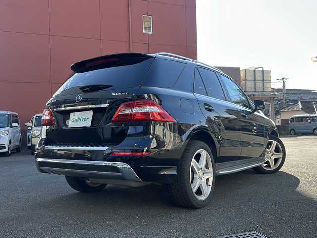 メルセデス・ベンツ ＭＬ３５０ ブルーテック 4マチック 宮崎県 2014(平26)年 12.9万km オブシディアンブラック メモリナビ（フルセグ/BT）/全方位カメラ/レーダークルーズコントロール/BSM/サンルーフ/プッシュスタート/電動リアゲート/パワーシート（D/N席）/シートヒーター全席/ダウンヒルアシストコントロール/車高調整オフロードモード/純正アルミホイール/純正ETC/オートライト