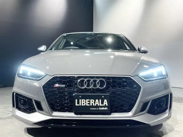 アウディ ＲＳ５ スポーツバック 道央・札幌 2019(令1)年 3.6万km グレー アシスタンスパッケージ/・パークアシスト/・サラウンドビューカメラ/RSスポーツエグゾーストシステム/マトリクスLEDヘッドライト/Sスポーツシート(フロント)/ファインナッパレザー/電動調整機能(フロント)/シートヒーター(全席)/MMIナビゲーション/バーチャルコックピット/TVチューナー/Bang&Olufsen3Dアドバンストサウンドシステム/マルチカラーアンビエントライティング/オートマチックテールゲート/ドライブセレクト/レッドキャリパー/アダプティブクルーズコントロール/アウディアクティブレーンアシスト/アウディサイドアシスト/アウディパーキングシステム/アウディプレセンスベーシック/アウディプレセンスリヤ/アウディプレセンスシティ/パドルシフト/プッシュスタート/スマートキー/スペアキー/ETC2.0
