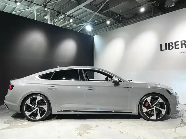 アウディ ＲＳ５ スポーツバック 道央・札幌 2019(令1)年 3.6万km グレー アシスタンスパッケージ/・パークアシスト/・サラウンドビューカメラ/RSスポーツエグゾーストシステム/マトリクスLEDヘッドライト/Sスポーツシート(フロント)/ファインナッパレザー/電動調整機能(フロント)/シートヒーター(全席)/MMIナビゲーション/バーチャルコックピット/TVチューナー/Bang&Olufsen3Dアドバンストサウンドシステム/マルチカラーアンビエントライティング/オートマチックテールゲート/ドライブセレクト/レッドキャリパー/アダプティブクルーズコントロール/アウディアクティブレーンアシスト/アウディサイドアシスト/アウディパーキングシステム/アウディプレセンスベーシック/アウディプレセンスリヤ/アウディプレセンスシティ/パドルシフト/プッシュスタート/スマートキー/スペアキー/ETC2.0