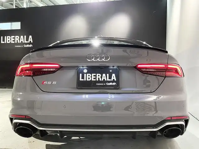 アウディ ＲＳ５ スポーツバック 道央・札幌 2019(令1)年 3.6万km グレー アシスタンスパッケージ/・パークアシスト/・サラウンドビューカメラ/RSスポーツエグゾーストシステム/マトリクスLEDヘッドライト/Sスポーツシート(フロント)/ファインナッパレザー/電動調整機能(フロント)/シートヒーター(全席)/MMIナビゲーション/バーチャルコックピット/TVチューナー/Bang&Olufsen3Dアドバンストサウンドシステム/マルチカラーアンビエントライティング/オートマチックテールゲート/ドライブセレクト/レッドキャリパー/アダプティブクルーズコントロール/アウディアクティブレーンアシスト/アウディサイドアシスト/アウディパーキングシステム/アウディプレセンスベーシック/アウディプレセンスリヤ/アウディプレセンスシティ/パドルシフト/プッシュスタート/スマートキー/スペアキー/ETC2.0