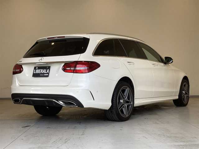 メルセデス・ベンツ Ｃ２００ ステーションワゴン アバンギャルドAMGライン 熊本県 2018(平30)年 5.3万km ダイヤモンドホワイト ・スマートキー/・プッシュスタート/・パノラマサンルーフ /・道路標識アシスト/・アクティブブレーキアシスト/・アテンションアシスト/・レーンチェンジアシスト/・ブラインドスポットモニター/・インテリジェントライトシステム/・アクティブステアリングアシスト/・クルーズコントロール(追従式)/・黒革シート/・前席パワーシート/・前席シートヒーター /・純正HDDナビ/　【Bluetooth・USB・AppleCarPlay・AndroidAuto】/・Burmesterサウンドシステム/・フルセグTV/・バックカメラ/・ETC2.0/・パワーバックドア/・LEDヘッドランプ/・純正マット/・保証書/取説