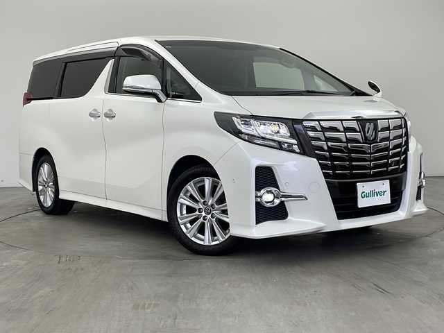 トヨタ アルファード S Cパッケージ 兵庫県 2015(平27)年 7.3万km ホワイトパールクリスタルシャイン ・純正ナビ/SD/USB/BT/TV/・JBLプレミアムサウンド/・バックカメラ/・ビルトインETC/・両側パワースライドドア/・パワーバックドア/・プリクラッシュセーフティ/・レーダークルーズコントロール/・インテリジェントクリアランスソナー/・インテリジェントパーキングアシスト/・電子パーキング/・オートホールド/・ハーフレザーシート/・前席パワーシート/・運転席メモリーシート/・2列目オットマン/・ステアリングヒーター/・革巻きステアリング/・MTモード付AT/・nanoe/・デュアルオートエアコン/・防眩ミラー/・純正フロアマット/・スマートキー/・スペアキー