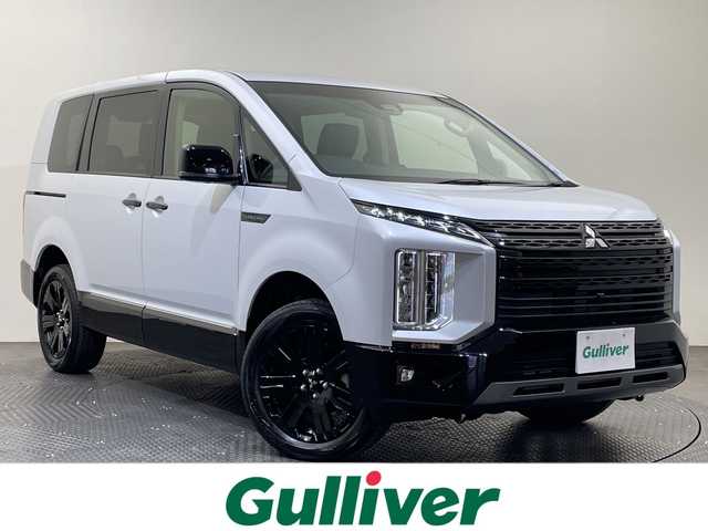 三菱 デリカＤ：５ シャモニー 愛媛県 2025(令7)年 0.1千km ホワイトダイヤモンド CHAMONIX (7人)　4WD　e-Assist/ステップレス　（7人）D:5専用11型ナビゲーション/フルセグ／Ｂｌｕｅｔｏｏｔｈ／ＵＳＢ/全方位カメラ/衝突被害軽減ブレーキ/レーダークルーズコントロール/パワーバックドア/Ｄ席パワーシート/ＤＮ席シートヒーター/両側電動ドア/オートマチックハイビーム/ブラインドスポットモニター/スペアキー