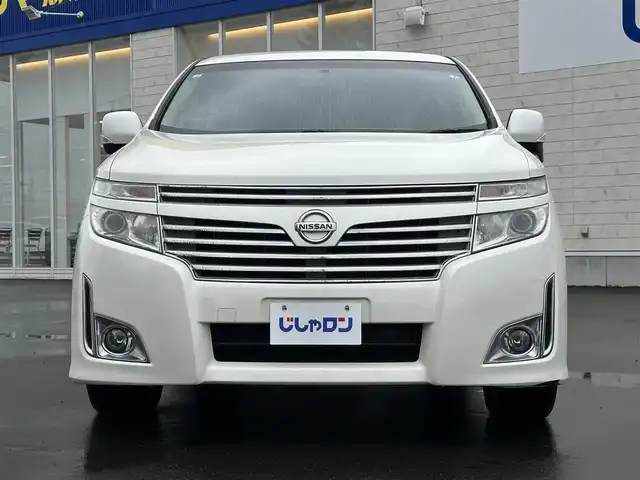 日産 エルグランド 250ハイウェイスター 道北・旭川 2013(平25)年 10.8万km ブリリアントホワイトパール (株)IDOMが運営する【じしゃロン旭川店】の自社ローン専用車両になります。こちらは現金またはオートローンご利用時の価格です。自社ローンご希望の方は別途その旨お申付け下さい・/　/・純正ナビ(CD/DVD/BT/SD/フルセグ)/・ビルトインETC/・両席パワースライドドア/・横滑り防止装置/・社外フリップダウンモニター/・電動格納ウィンカーミラー/・プッシュスタート/・スマートキー/・フォグランプ/・取扱説明書