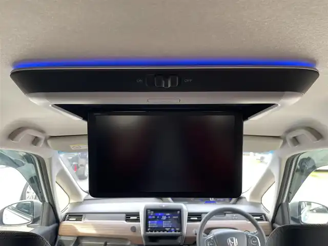 ホンダ フリード ハイブリット クロスター 兵庫県 2023(令5)年 1.2万km フィヨルドミストパール 純正9インチプレミアムインターナビ/Bluetooth/フルセグ/HDMI/アップルカープレイ/CD/DVD/純正15.6インチフリップダウン/ETC/両側パワースライド/ハーフレザーシート/シートヒーター