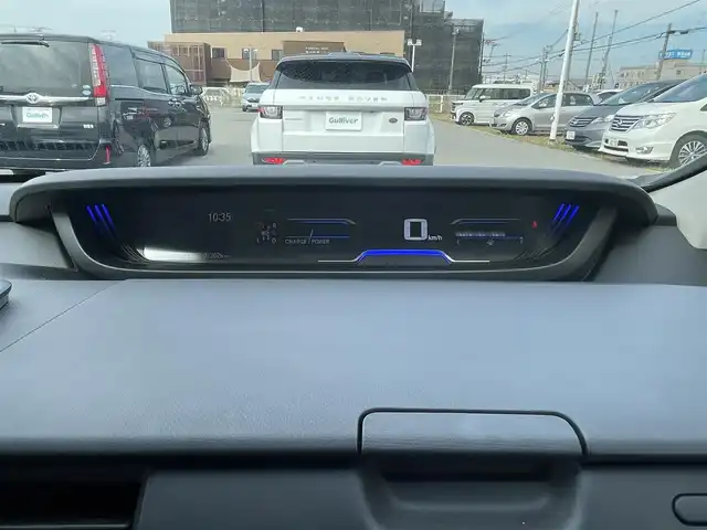 ホンダ フリード ハイブリット クロスター 兵庫県 2023(令5)年 1.2万km フィヨルドミストパール 純正9インチプレミアムインターナビ/Bluetooth/フルセグ/HDMI/アップルカープレイ/CD/DVD/純正15.6インチフリップダウン/ETC/両側パワースライド/ハーフレザーシート/シートヒーター