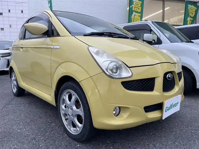 スバル Ｒ１ R 愛知県 2005(平17)年 8.2万km トパーズイエロー ハーフレザー（ブラック＆レッド）　/キーレス　/電動格納ミラー　/ハロゲンヘッドライト　/オーディオ　/ＣＤ　/ラジオ　/フロアマット　/ドアバイザー　/パワーステアリング　/純正１５インチＡＷ