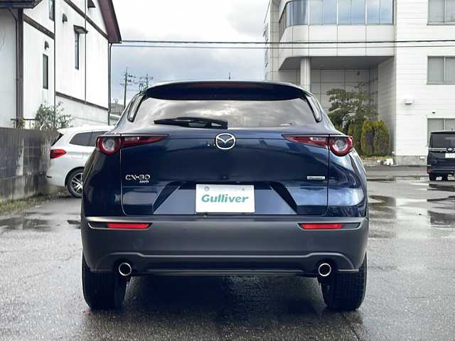 マツダ ＣＸ－３０ 20S プロアクティブツーリングセレ 福井県 2022(令4)年 2.6万km ディープクリスタルブルーマイカ ワンオーナー/４WD/メーカーオプション/・CD/DVD+地上デジタルTVチューナー（フルセグ）/・スーパーUVカットガラス＋IRカットガラス/・360°セーフティパッケージ/純正メモリナビゲーション/（CD/DVD/BT）/フルセグテレビ/３６０°カメラ/プリクラッシュセーフティ/ブラインドスポットモニター/アダプティブクルーズコントロール/レーンキープアシスト/ヘッドアップディスプレイ/パワーバックドア/クリアランスソナー/D席パワーシート/（シートメモリ付き）/前席シートヒーター/LEDヘッドライト/LEDフォグランプ/オートライト/オートハイビーム/ステアリングヒーター/前後ドライブレコーダー/ETC(ビルトイン)/パドルシフト/プッシュスタート/スマートキー/保証書/取扱説明書