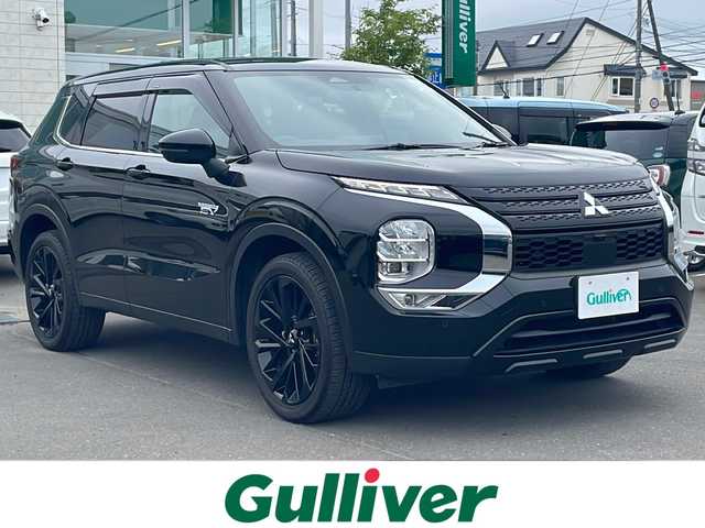 三菱 アウトランダー ＰＨＥＶ ブラックエディション 道東・釧路十勝 2022(令4)年 2.8万km アメジストブラック e-Assist/・衝突被害軽減ブレーキシステム（FCM）/・車線逸脱警報システム（LDW）/・レーダークルーズコントロールシステム（ACC）/・誤発進抑制機能（前進＆後退時）（UMS）/・オートマチックハイビーム[AHB]/マイパイロット/ヘッドアップディスプレイ/アイドリングストップ/エレクトリックテールゲート/運転席パワーシート/前席シートヒーター/ハーフレザーシート/ワイヤレス充電/純正コネクトナビ/地デジTV/【Bluetooth接続】/マルチアラウンドモニター/ETC（2.0）/LEDヘッドライト/フォグライト/ウインカーミラー/革巻きステアリング/ステアリングヒーター/ステアリングスイッチ/パドルシフト/純正20インチアルミホイル/サイド/カーテンエアバッグ/キーレスオペレーションシステム