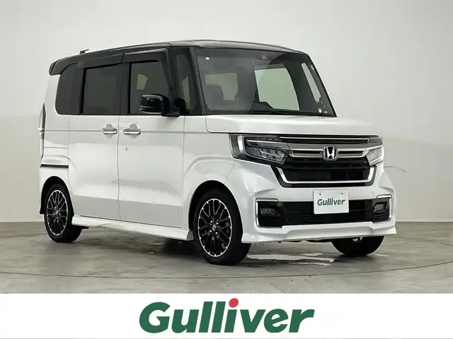 ホンダ Ｎ ＢＯＸ カスタム L ターボ 滋賀県 2021(令3)年 2.8万km パールⅡ 社外ナビ/Bluetooth/USB/CD/DVD/フルセグテレビ/バックカメラ/ホンダセンシング/・衝突軽減ブレーキ/・誤発進抑制機能/・後方誤発進抑制機能/・歩行者事故低減ステアリング/・先行車発進お知らせ機能/・アダプティブクルーズコントロール/・オートハイビーム/ETC/後席モニター/レザーシート/D/N席シートヒーター /両側パワースライドドア/LEDヘッドライト/オートライト/アイドリングストップ/プッシュスタート /スマートキー