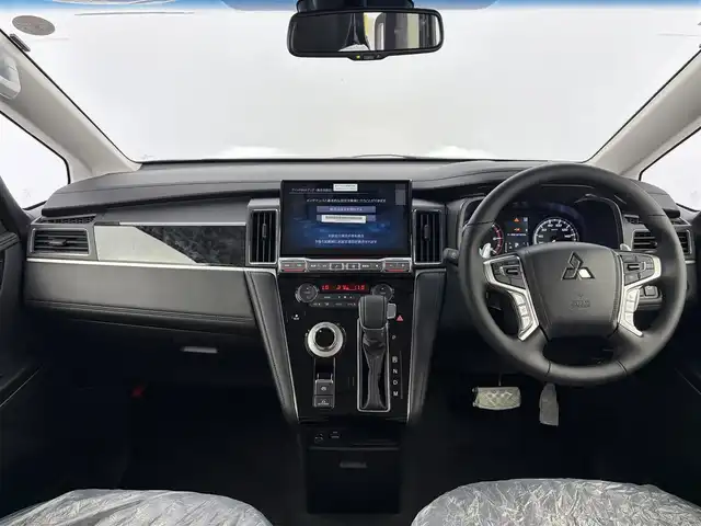 三菱 デリカＤ：５ ブラックエディション 愛知県 2025(令7)年 0.1千km ブラックマイカ 登録済未使用車/純正ナビ/バックカメラ/両側パワースライドドア/レザーシート/衝突被害軽減ブレーキ/車線逸脱警報システム/レーダークルーズコントロール/純正18インチアルミホイール/LEDヘッドライト/フルセグTV/スマートキー/プッシュスタート/電動格納ミラー