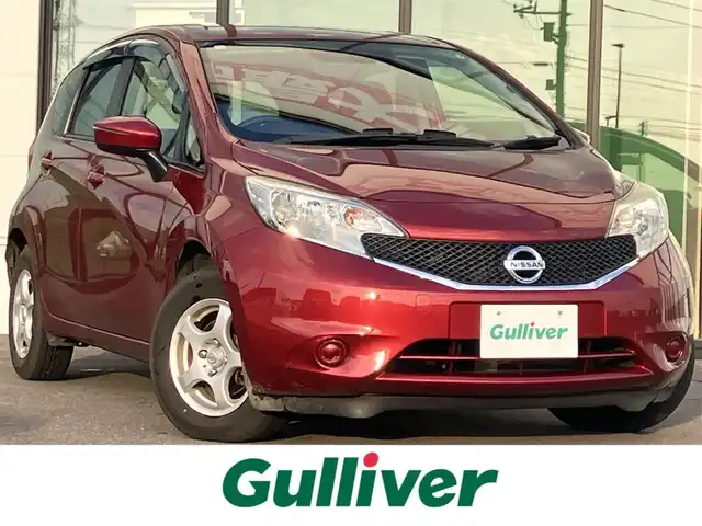日産 ノート X FOUR 道南・函館 2015(平27)年 8.6万km ラディアントレッド /純正ナビ//フルセグＴＶ//バックカメラ//衝突被害軽減ブレーキ//車線逸脱警報//横滑り防止装置//ABS//プッシュスタート//スマートキー//純正フロアマット//取扱説明書//記録簿