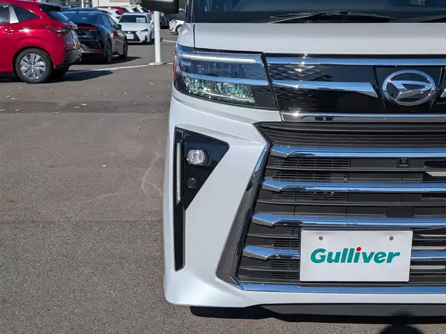 ダイハツ タント カスタム X 福井県 2023(令5)年 1.8万km シャイニングホワイトパール 純正ナビ/AM/FM/フルセグ/BT/CD/DVD/USB/iPod/全方位カメラ/両側パワースライドドア/衝突被害軽減システム/パーキングアシスト/アイドリングストップ/レーンキープアシスト/横滑り防止装置/盗難防止装置/前後コーナーセンサー/前後ドライブレコーダー/前席シートヒーター/純正フロアマット/ビルトインETC/純正14インチAW/LEDヘッドライト/オートライト/スマートキー