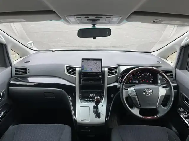 トヨタ ヴェルファイア 2．4Z 道央・札幌 2012(平24)年 12.8万km ホワイトパールクリスタルシャイン ４WD/社外HDDナビ/CD/DVD/MD/フルセグ/社外フリップダウンモニター/横滑り防止装置/クリアランスソナー/バックカメラ/ビルトインETC/センターデフロック/ECOMODE/nanoe/両側パワースライドドア/2列目オットマン/革巻きウッドコンビステアリング/ステアリングリモコン/MTモード付AT/プッシュスタート/スマートキー/HIDヘッドライト/オートライト/フォグランプ/電動格納ミラー/ウィンカーミラー/純正フロアマット/ドアバイザー/社外AW付夏タイヤ積込/235/50/R18/2017年/山6mm