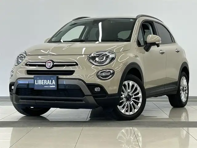フィアット ５００Ｘ クロス 岡山県 2020(令2)年 2.1万km ベージュ FIAT純正ディスプレイオーディオ/アップルカープレイ/Bluetooth/USB/前面衝突警報/車線逸脱警報/パーキングセンサー/自動格納サイドミラー/ブラインドスポット警告/アクティブパークビューリアカメラ/雨滴検知ワイパー/自動パーキングブレーキ/ウエルカムライト/アダプティブヘッドライト/ドラレコ（F/R）/オートハイビーム