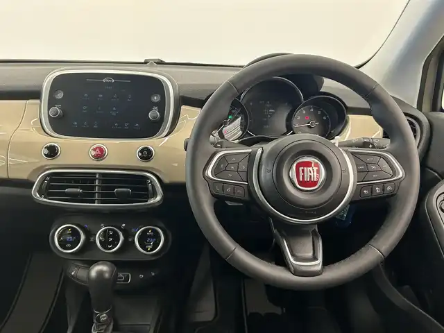 フィアット ５００Ｘ クロス 岡山県 2020(令2)年 2.1万km ベージュ FIAT純正ディスプレイオーディオ/アップルカープレイ/Bluetooth/USB/前面衝突警報/車線逸脱警報/パーキングセンサー/自動格納サイドミラー/ブラインドスポット警告/アクティブパークビューリアカメラ/雨滴検知ワイパー/自動パーキングブレーキ/ウエルカムライト/アダプティブヘッドライト/ドラレコ（F/R）/オートハイビーム