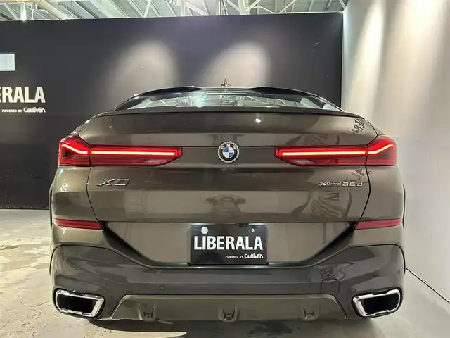 ＢＭＷ Ｘ６ xDrive35d Mスポーツ 道央・札幌 2020(令2)年 2.1万km ＤグリーンＭ 電動パノラマガラスサンルーフ/カーボンファイバーインテリアトリム/harman/kardonサラウンドサウンド/BMWディスプレイキー/コンフォートパッケージ/・フロントアクティブベンチレーションシート/・フロントマッサージシート/・ヒートコンフォートパッケージ/プラスパッケージ/・4ゾーンオートマチックエアコンディショナー/・保冷保温機能付カップホルダー/・ソフトクローズドア/BMWヘッドアップディスプレイ/BMWライブコックピット/パーキングアシストプラス/・全周囲カメラ/・パーキングアシスト(並列/縦列)/・パークディスタンスコントロール/アダプティブLEDヘッドライト/ハイビームアシスタント/ドライビングアシストプロフェッショナル/・ACC/アクティブクルーズコントロール/・ステアリング&レーンコントロールアシスト/・前車接近警告機能/・衝突回避被害軽減ブレーキ/・クロストラフィックウォーニング/・トラフィックサインアシスト/Mエアロダイナミクスパッケージ