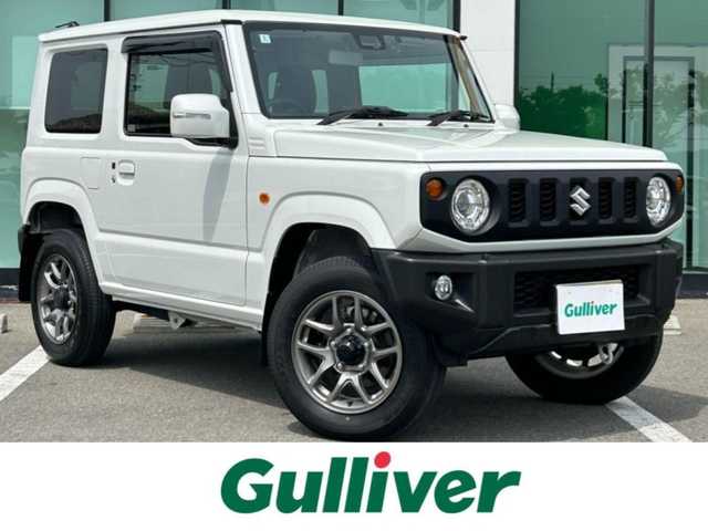 スズキ ジムニー XC 和歌山県 2024(令6)年 1.3万km ピュアホワイトP 社外8インチナビ/Bluetooth/フルセグテレビ/CD/DVD/バックカメラ/USB入力端子/HDMI入力端子/衝突被害軽減システム/車線逸脱警報装置/横滑り防止装置/ダウンヒルアシスト/デュアルカメラブレーキサポート/前後ドライブレコーダー/クルーズコントロール/シートヒーター/LEDヘッドライト/オートライト/純正16インチアルミホイール/革巻きステアリング/ステアリングリモコン/社外フロアマット/ドアバイザー/スマートキー/プッシュスタート/電動格納ミラー