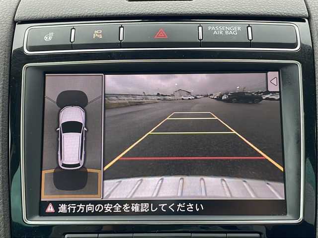 フォルクスワーゲン トゥアレグ V6 富山県 2017(平29)年 4万km 白 純正ＨＤＤナビ　/地デジ　/本革シート　/全方位カメラ　/バックカメラ　/コーナーセンサー　/ルーフレール　/ＬＥＤヘッドライト　/レーダークルーズコントロール　/パワーシート　/スマートキー　/純正アルミホイール/純正オーディオ/ウィンカーミラー/電動格納ミラー/アイドリングストップ　/ＥＴＣ