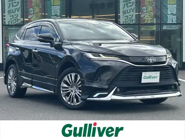 トヨタ ハリアー ハイブリッド Z レザーパッケージ 岡山県 2020(令2)年 8.2万km プレシャスブラックパール 登録時走行距離82062km/モデリスタフルエアロ/JBLプレミアムサウンドシステム/純正12.3インチナビ/フルセグTV(AM.FM.TV.BT)/全方位カメラ/ETC2.0/ブラインドスポットモニター/デジタルインナーミラー/ドライブレコーダー/シートヒーター（D+N席）/エアシート（D+N席）/ステアリングヒーター/本革巻きステアリング/クリアランスソナー/衝突軽減ブレーキ/横滑り防止装置/クルーズコントロール(追従走行あり)/車線逸脱警報（レーンキープアシスト）/オートライト/オートマチックハイビーム/アイドリングストップ/電動リアゲート/19インチ純正AW/レザーシート/D+N席パワーシート