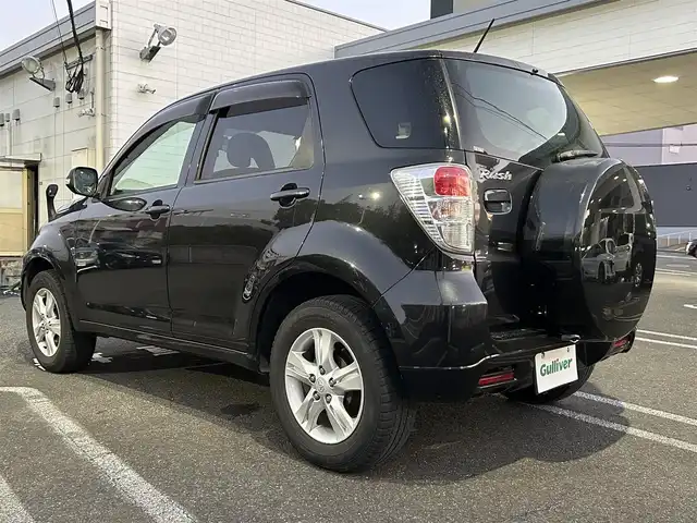 トヨタ ラッシュ G 長崎県 2011(平23)年 6.2万km ブラックマイカメタリック 社外ディスプレイオーディオ（ＣＤ／ＤＶＤ）/4WD/背面タイヤ/AAC/電動格納ミラー/キセノンヘッドライト/ABS/PW