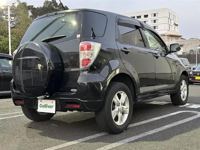 トヨタ ラッシュ G 長崎県 2011(平23)年 6.2万km ブラックマイカメタリック 社外ディスプレイオーディオ（ＣＤ／ＤＶＤ）/4WD/背面タイヤ/AAC/電動格納ミラー/キセノンヘッドライト/ABS/PW