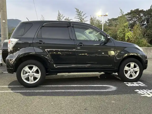 トヨタ ラッシュ G 長崎県 2011(平23)年 6.2万km ブラックマイカメタリック 社外ディスプレイオーディオ（ＣＤ／ＤＶＤ）/4WD/背面タイヤ/AAC/電動格納ミラー/キセノンヘッドライト/ABS/PW