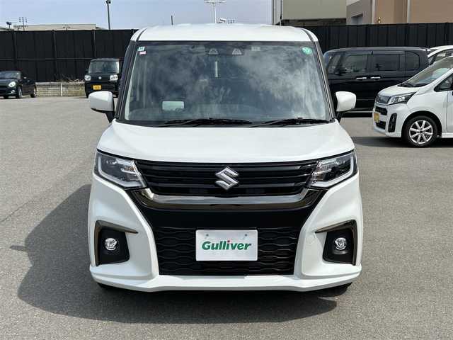 スズキ ソリオ HV SZ 山形県 2024(令6)年 0.6万km ピュアホワイトP メモリナビ/　　【CD BT ワンセグ USB】/バックカメラ/両側パワースライドドア/レーダークルーズコントロール/LEDオートヘッドライト/シートヒーター/純正15インチアルミホイール/アイドリングストップ/コーナーセンサー/ステアリングスイッチ/パドルシフト/電動格納ウィンカーミラー/フォグランプ/スマートキー/ETC