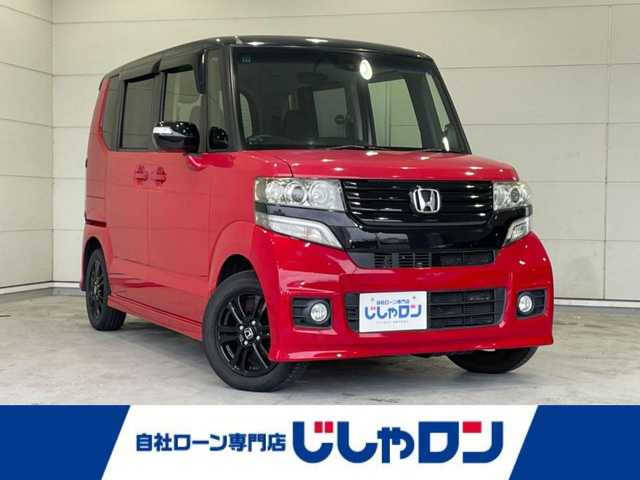 ホンダ Ｎ ＢＯＸ 沖縄県 2014(平26)年 5.4万km ミラノレッド (株)IDOMが運営する【じしゃロンコザ店】の自社ローン専用車両になりますこちらは現金またはオートローンご利用時の価格です。自社ローンご希望の方は別途その旨お申付け下さい/・純正ナビ/・バックカメラ/・Bluetooth接続/・TV/・DVD再生/・片側パワースライドドア/・スマートキー/・プッシュスタート/・純正アルミホイール/・オートライト