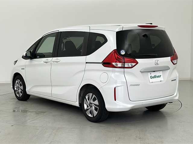 ホンダ フリード ハイブリット G ホンダセンシング 宮城県 2021(令3)年 3.8万km プラチナホワイトパール Honda SENSING	/・衝突軽減ブレーキ/・路外逸脱抑制機能		/・アダプティブクルーズコントロール	/・車線維持支援システム/バックカメラ/純正7型ナビ　地図SD無/フルセグTV/ビルトインETC/ドライブレコーダー（F）/LEDヘッドライト/フロアマット/ステアリングスイッチ/プッシュスタート/スマートキー×2/横滑り防止装置