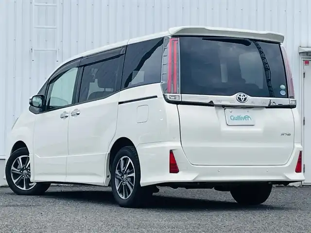 トヨタ ノア Si ダブルバイビーⅡ 熊本県 2019(令1)年 7.7万km ラグジュアリーホワイトパールクリスタルシャインガラスフレーク 純正ナビ/（BT/CD/DVD/AM/FM)/フルセグTV/バックカメラ/前後ドラレコ/ビルトインETC/トヨタセーフティーセンス/・パーキングサポートブレーキ/・プリクラッシュセーフティー/・クリアランスソナー/・レーンディパーチャーアラート/・先行車発進お知らせ機能/・オートハイビーム/横滑り防止/クルーズコントロール/両側パワースライドドア/ハーフレザーシート/革巻きステアリング/・ステアリングリモコン/プッシュスタート/・スマートキー/・アイドリングストップ/オートライト/・LEDヘッドライトフォグライト/純正ドアバイザー/社外フロアマット/後席サンシェード