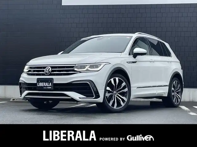 フォルクスワーゲン ＶＷ ティグアン TSI Rライン 静岡県 2021(令3)年 3.9万km オリックスホワイトパールエフェクト ワンオーナー /DiscoverPRO ナビBluetooth CarPlay対応/デジタルメーター/ヘッドアップディスプレイ/パノラマサンルーフ/ブラックレザーシートシートヒーター /ステアリングヒーター/前席メモリーパワーシート/harman/kardonサラウンド/パワーバックドア /フロントアシスト サイドアシスト/レーンチェンジアシスト/前後ドライブレコーダー/DSRCETC/フィルム施工