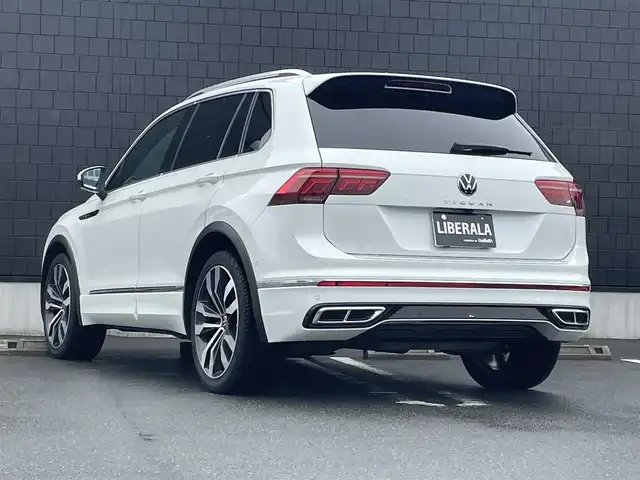フォルクスワーゲン ＶＷ ティグアン TSI Rライン 静岡県 2021(令3)年 3.9万km オリックスホワイトパールエフェクト ワンオーナー /DiscoverPRO ナビBluetooth CarPlay対応/デジタルメーター/ヘッドアップディスプレイ/パノラマサンルーフ/ブラックレザーシートシートヒーター /ステアリングヒーター/前席メモリーパワーシート/harman/kardonサラウンド/パワーバックドア /フロントアシスト サイドアシスト/レーンチェンジアシスト/前後ドライブレコーダー/DSRCETC/フィルム施工