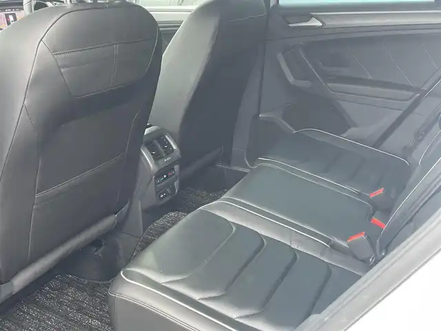フォルクスワーゲン ＶＷ ティグアン TSI Rライン 静岡県 2021(令3)年 3.9万km オリックスホワイトパールエフェクト ワンオーナー /DiscoverPRO ナビBluetooth CarPlay対応/デジタルメーター/ヘッドアップディスプレイ/パノラマサンルーフ/ブラックレザーシートシートヒーター /ステアリングヒーター/前席メモリーパワーシート/harman/kardonサラウンド/パワーバックドア /フロントアシスト サイドアシスト/レーンチェンジアシスト/前後ドライブレコーダー/DSRCETC/フィルム施工