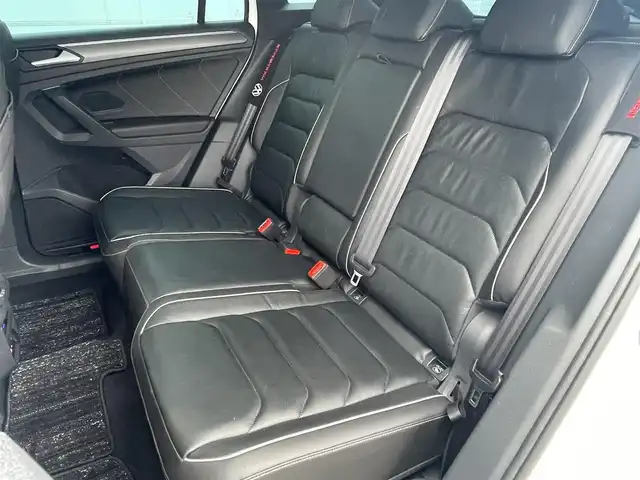 フォルクスワーゲン ＶＷ ティグアン TSI Rライン 静岡県 2021(令3)年 3.9万km オリックスホワイトパールエフェクト ワンオーナー /DiscoverPRO ナビBluetooth CarPlay対応/デジタルメーター/ヘッドアップディスプレイ/パノラマサンルーフ/ブラックレザーシートシートヒーター /ステアリングヒーター/前席メモリーパワーシート/harman/kardonサラウンド/パワーバックドア /フロントアシスト サイドアシスト/レーンチェンジアシスト/前後ドライブレコーダー/DSRCETC/フィルム施工
