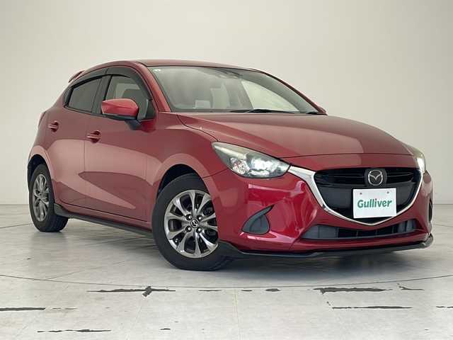 マツダ デミオ 13S ツーリング Lパッケージ 沖縄県 2017(平29)年 6.9万km ソウルレッドプレミアムメタリック 純正ナビ　　/　(フルセグＴＶ　Ｂｌｕｅｔｏｏｔｈ　ＣＤ／ＤＶＤ)/クルーズコントロール　/ハーフレザーシート　/シートヒーター　/ＬＥＤヘッドライト　/純正１５インチアルミホイール　/アイドリングストップ　/スマートキー/アイドリングストップ　/レーンキープアシスト/ETC