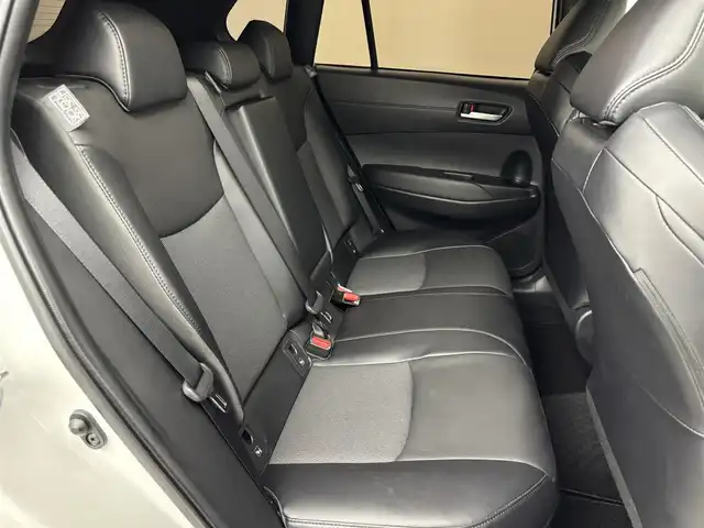 トヨタ カローラ クロス ハイブリッド Z 福岡県 2024(令6)年 1.3万km プラチナホワイトパールマイカ ワンオーナー　/モデリスタエアロ　/純正１０．５型ＤＡナビ/フルセグTV　/全方位カメラ　/ビルトインＥＴＣ２．０　/トヨタセーフティセンス　/レーダークルーズコントロール　/コーナーセンサー　/衝突軽減ブレーキ　/レーンキープ　/ブラインドスポットモニター　/アクセル踏み間違い防止　/パーキングアシスト　/パワーバックドア　/ハーフレザーシート　/パワーシート/シートヒーター　/ステアリングヒーター　/ルーフレール/ＬＥＤヘッドライト　/純正アルミホイール