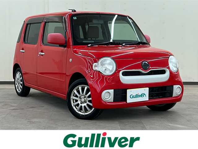 ダイハツ ミラ ココア X 道央・札幌 2016(平28)年 10.3万km シャイニングレッド ・4WD/・社外ナビ(DVD&CD&BT&フルセグ）/・電動格納ミラー/・ドアバイザー/・アイドリングストップ/・純正フロアマット/・ベンチシート/・社外アルミホイール/・キーレス/・ETC/・Wエアバッグ