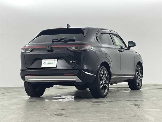 ホンダ ヴェゼル ハイブリッド e:HEV Z 福島県 2021(令3)年 3.3万km クリスタルブラックパール ホンダセンシング　/・ＣＭＢＳ/・路外逸脱抑制/・ＢＳＭ/・レーダークルーズコントロール/純正メモリナビゲーション　/バックカメラ　/ドライブレコーダ前後　/パワーバックドア　/電子パーキング　/・ブレーキホールド　/ハーフレザーシート　/ダウンヒルアシストコントロール　/シートヒーター　/・ステアヒーター/プッシュスタート/・スマートキー/・スペアキー/ステアリングスイッチ/・革巻きステアリング/・チルトステアリング/LEDライト/・オートライト/・フォグライト/フロント熱線/純正ラバーマット/ドアバイザー