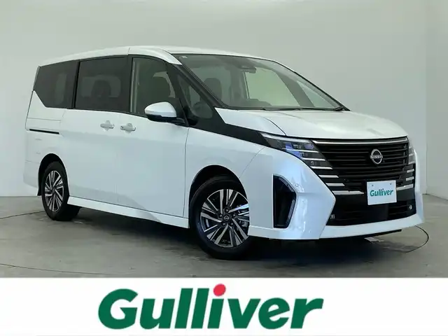 日産 セレナ e－パワー ハイウェイスター V 富山県 2023(令5)年 2.7万km プリズムホワイト 社外ナビ（AM/FM/BT/DVD/フルセグ）/バックカメラ/ALPINE後席モニター/ドライブレコーダー/ETC/ブラインドスポットモニター/衝突被害軽減システム/レーダークルーズコントロール/レーンキープアシスト/コーナーセンサー/横滑り防止装置/アイドリングストップ/オートLEDライト/オートマチックハイビーム/純正アルミホイール/社外フロアマット/オートホールド付電子パーキング/革巻きステアリング/ステアリングスイッチ/スマートキー/スペアキー