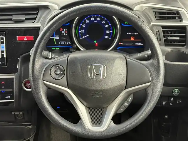 ホンダ フィット ハイブリット Fパッケージ 愛知県 2015(平27)年 9.1万km ティンテッドシルバーM 純正ナビ/（CD/DVD/Bluetooth/ワンセグ）/ETC/バックカメラ/横滑り防止/ステアスイッチ/ECOモード付き/ドアバイザー/電格ミラー/スマートキー/プッシュスタート/ハロゲンヘッドライト/マニュアルレベライザー