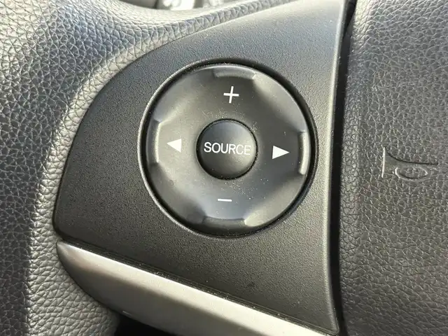 ホンダ フィット ハイブリット Fパッケージ 愛知県 2015(平27)年 9.1万km ティンテッドシルバーM 純正ナビ/（CD/DVD/Bluetooth/ワンセグ）/ETC/バックカメラ/横滑り防止/ステアスイッチ/ECOモード付き/ドアバイザー/電格ミラー/スマートキー/プッシュスタート/ハロゲンヘッドライト/マニュアルレベライザー